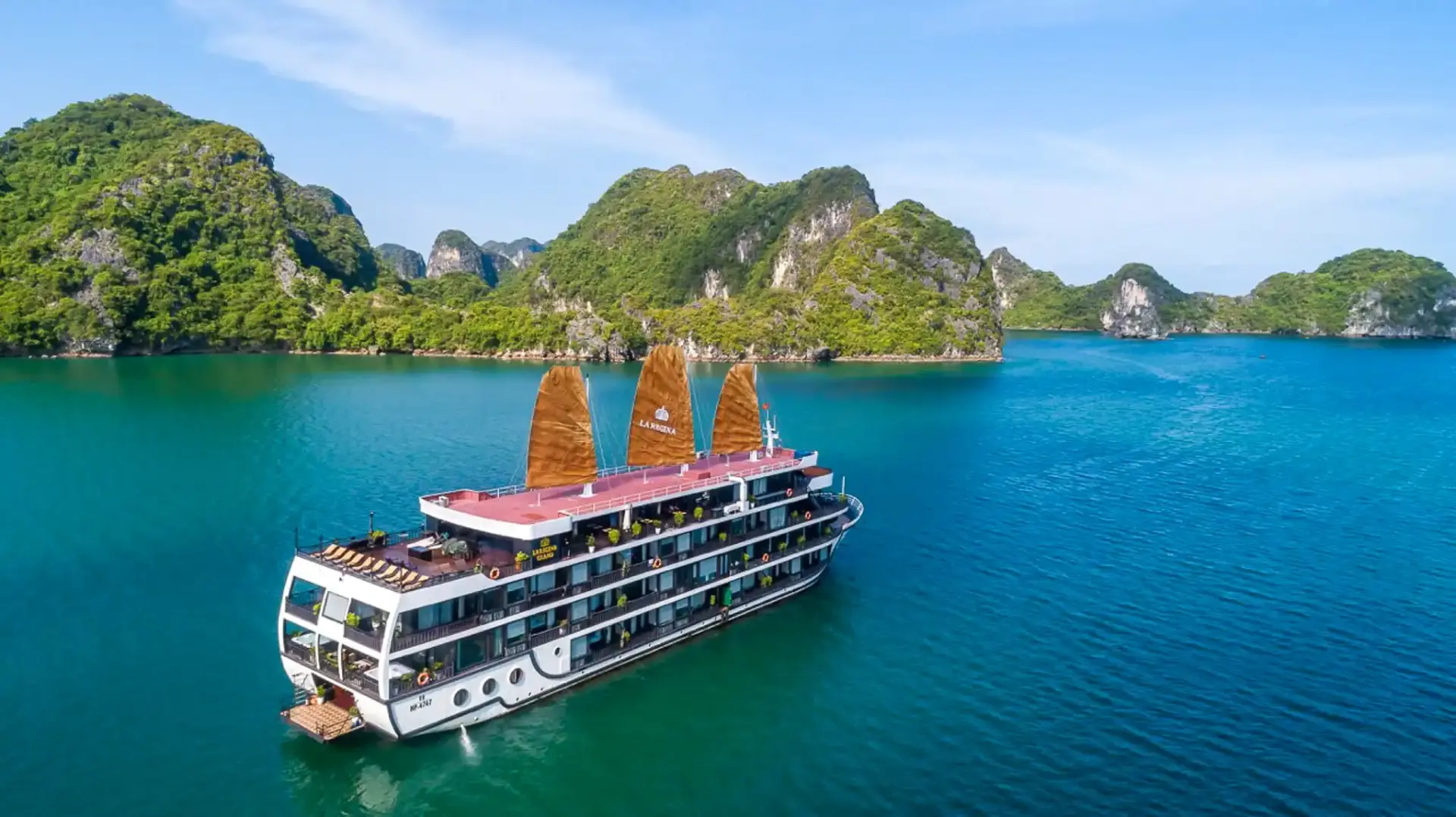 Traditional junk boat cruising Ha Long Bay